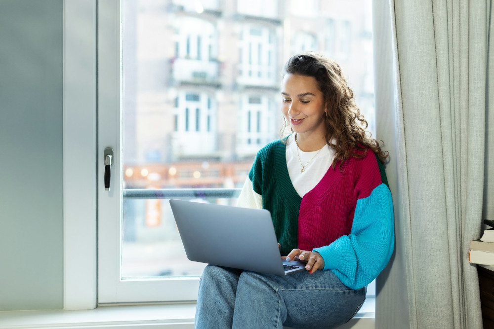 Relaxed woman working from her home