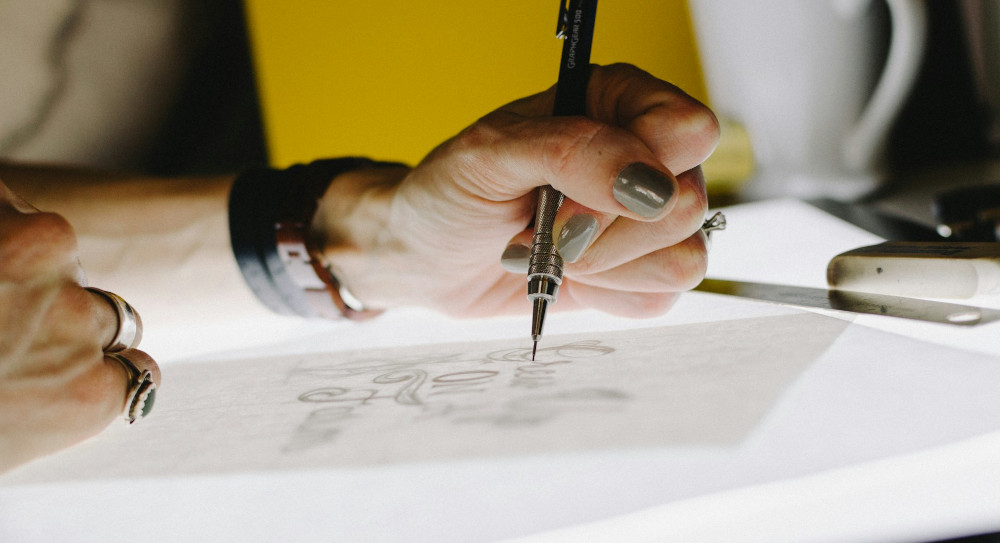 Woman working on a drawing