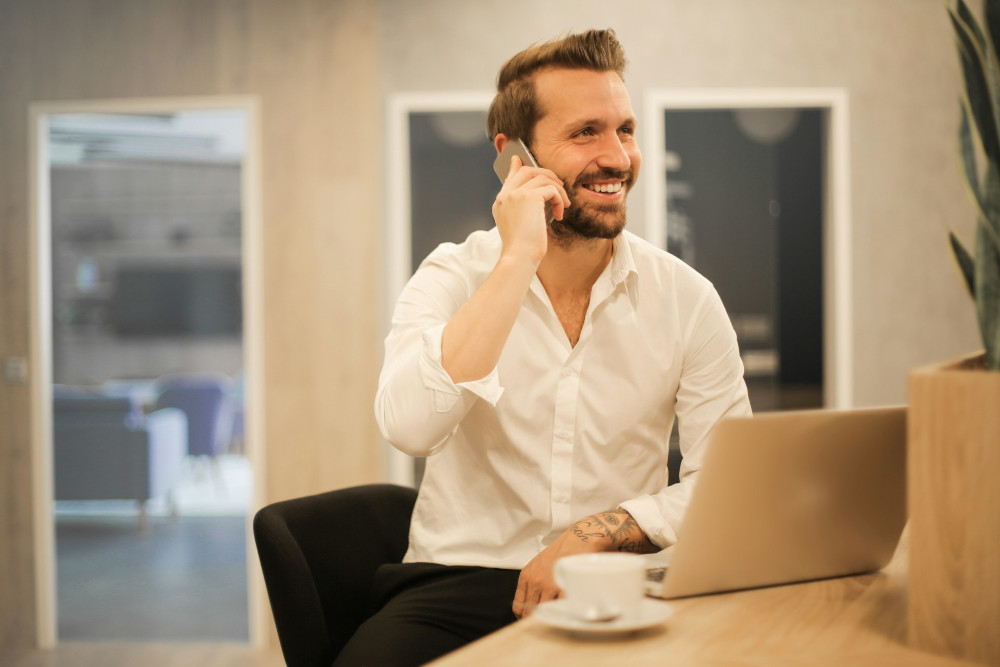 A man making a call at the office