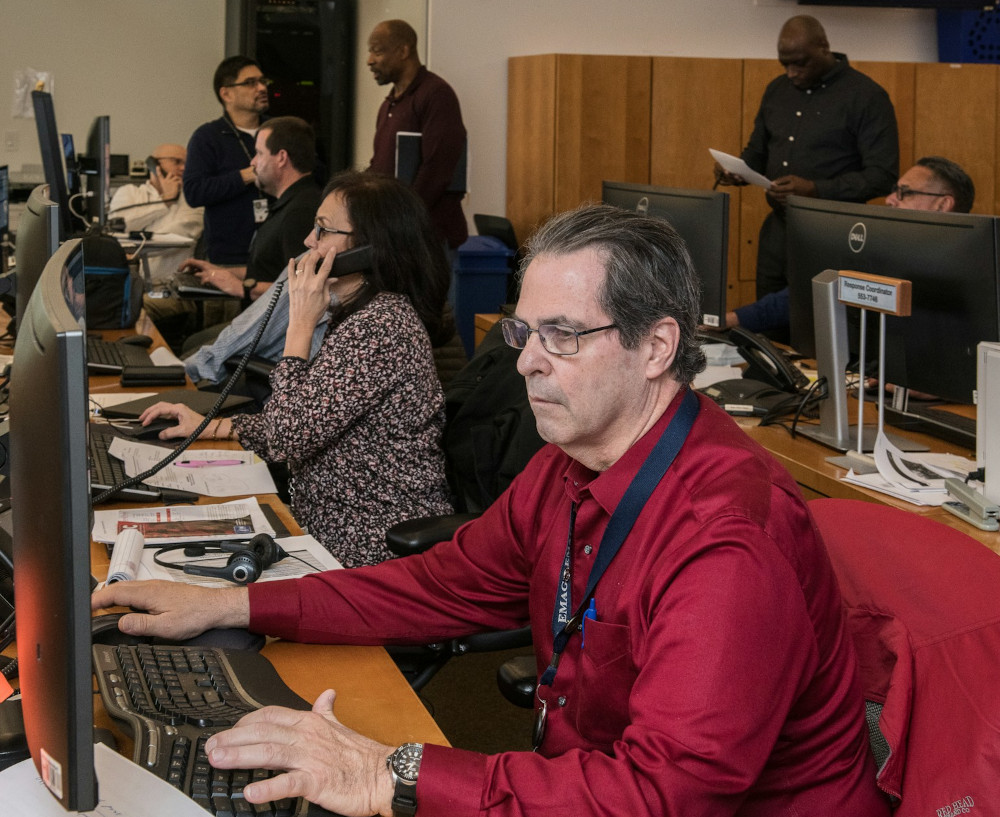 Team members focused on their individual assigned tasks