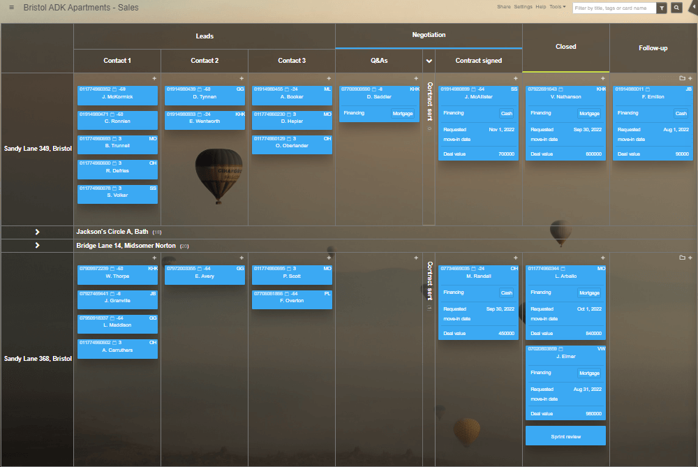 A Kanban Tool board view with tasks showing vital information on their fronts