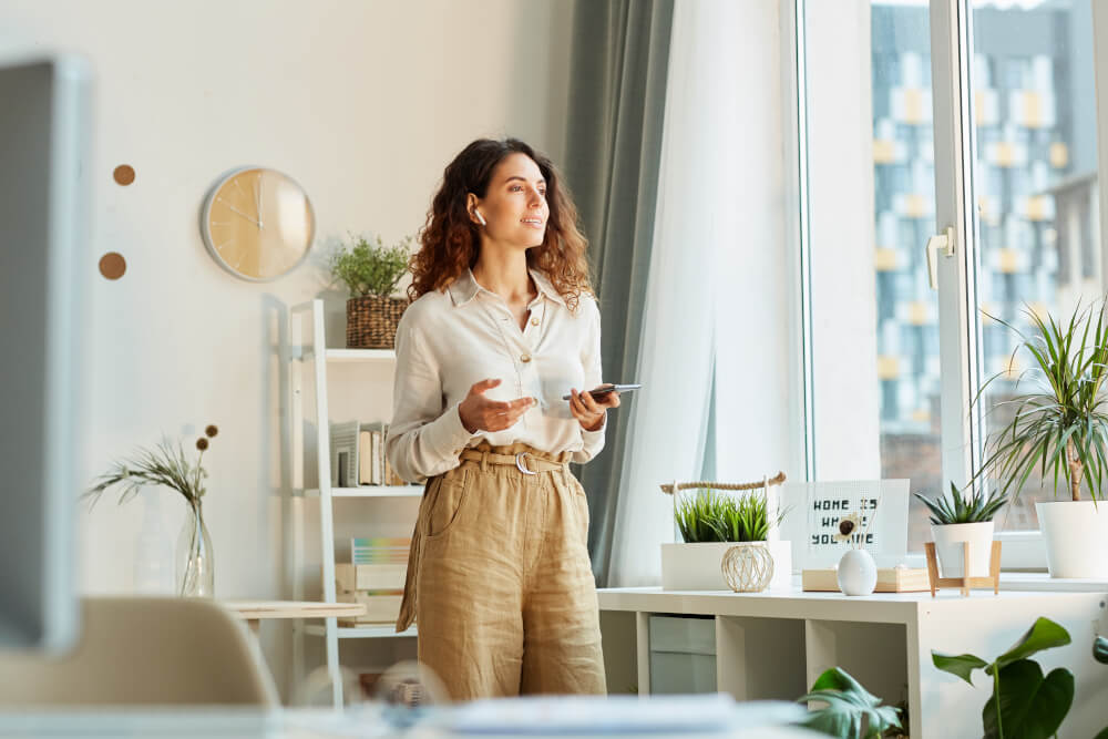 A manager is on a call at her home office