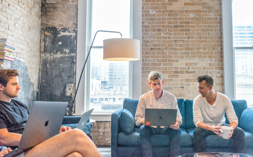 Team members carefully planning their work