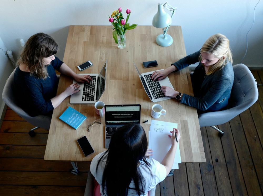 Colleagues working together at a table