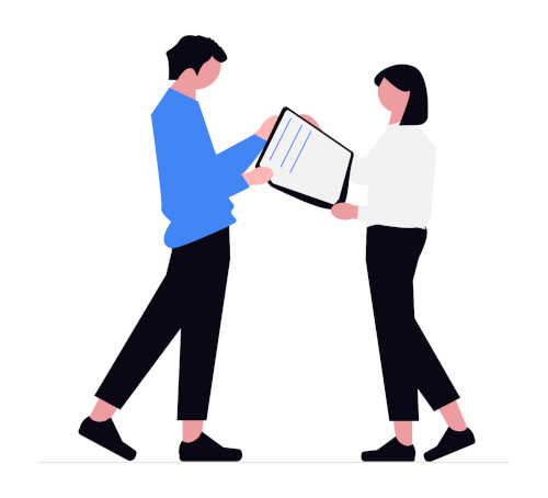 Colleagues discuss a work document